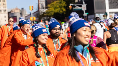 Volunteers watching runners