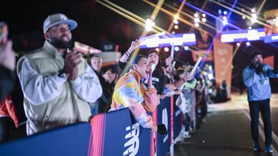 Spectators cheering on the final finishers