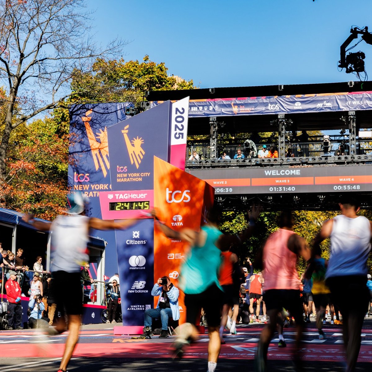 Runners coming through the finish line at the TCS New York City Marathon