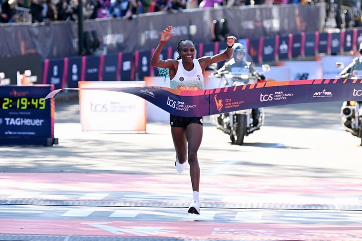 Hellen Obiri breaking tape at 2025 TCS NYC Marathon