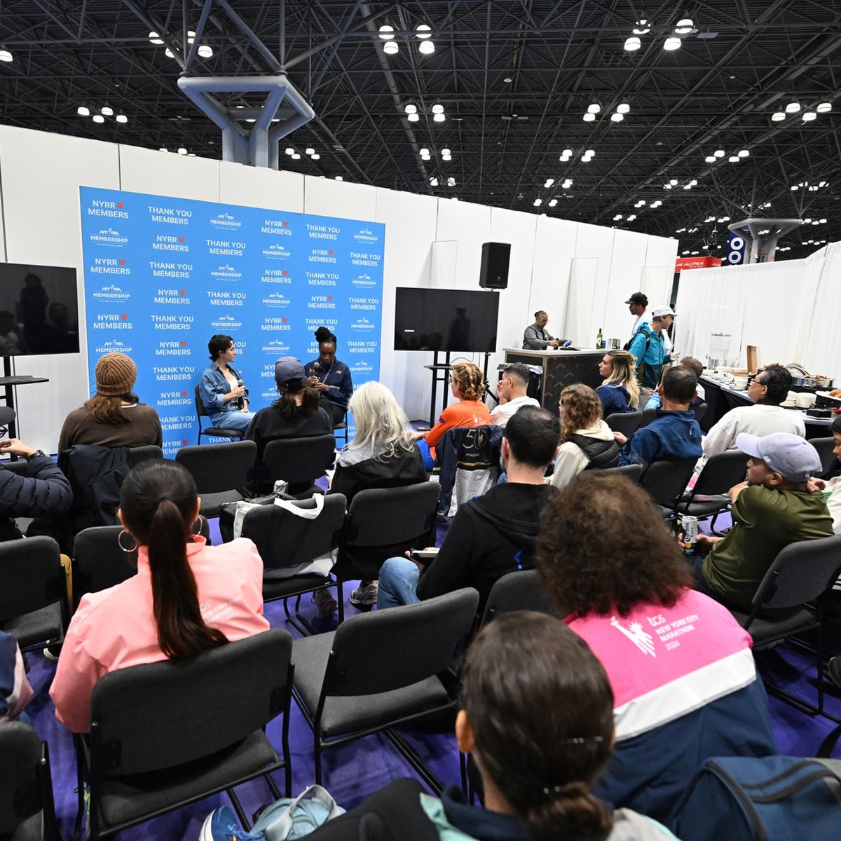 NYRR Members at the 2025 TCS New York City Marathon Expo Presented by New Balance