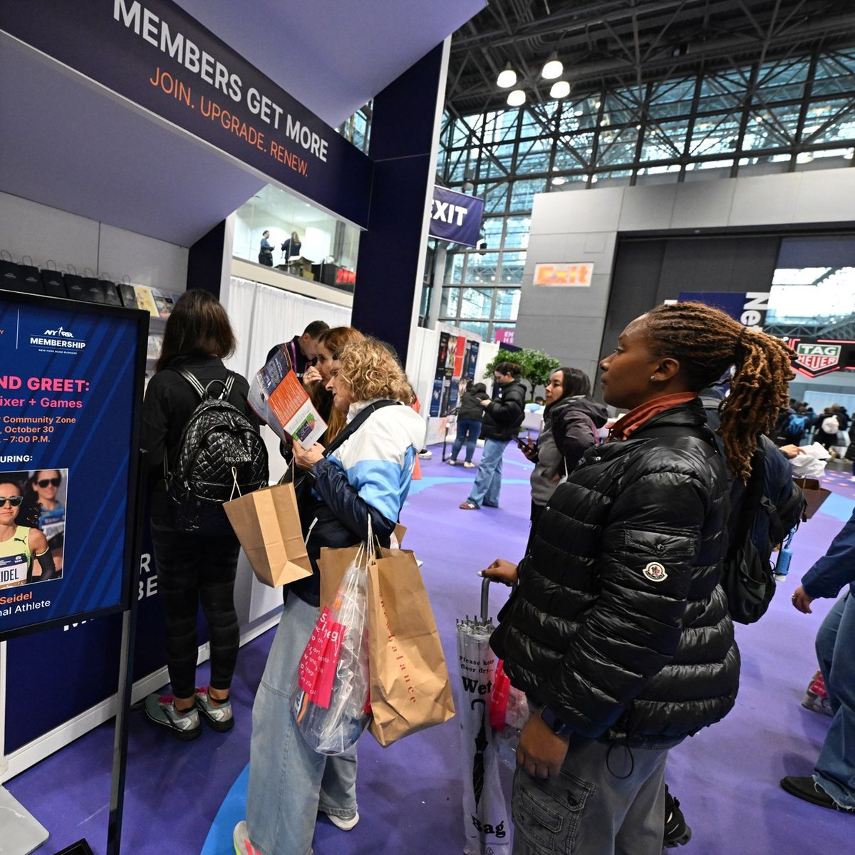 NYRR Members at the 2025 TCS New York City Marathon Expo Presented by New Balance