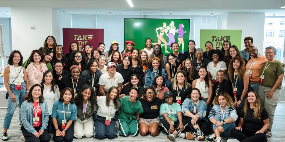 Group shot of the attendees at the Take the Lead retreat at NYRR office