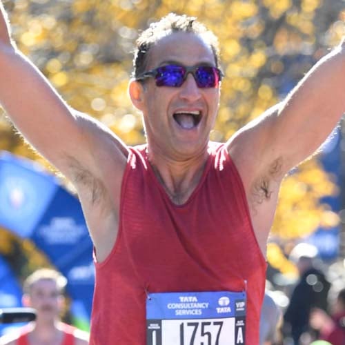 Headshot of NYRR Board of Directors member Michael Gross