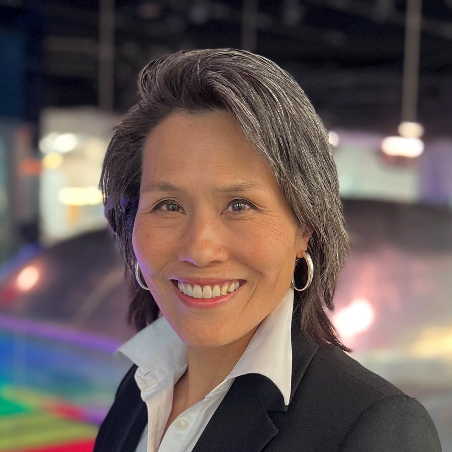 Headshot of NYRR Board of Directors Roslyn Tom