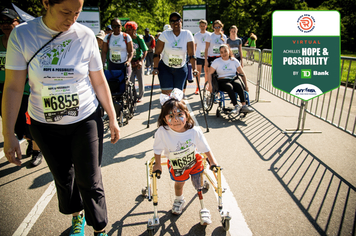 A Rising New York Road Runners athlete participating in the Achilles Hope & Possibility race while using a walker