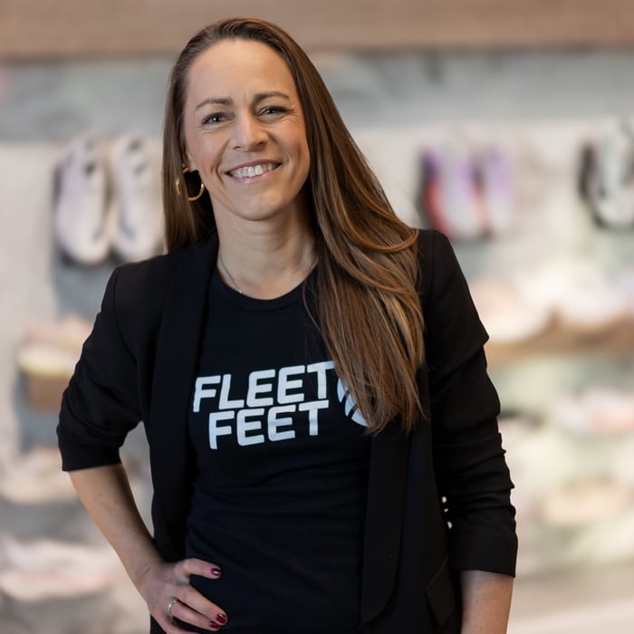 Headshot of Jenny Simpson in Fleet Feet shirt