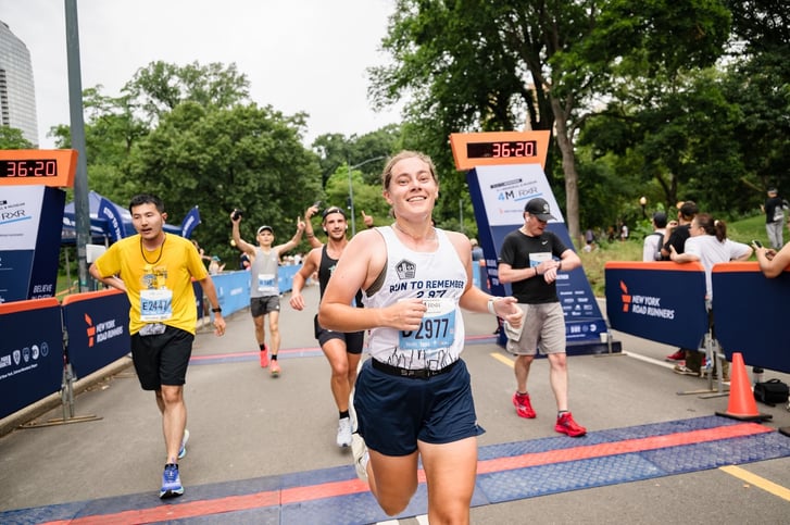 Hanna Born crossing the finish line at Run to Remember