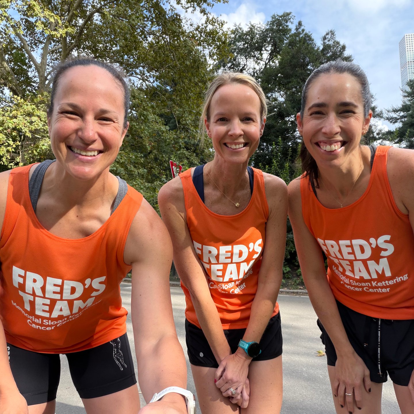 Sheena Lawrick, Sherie Buell, and Laura Lang wearing Fred's Team running tanks