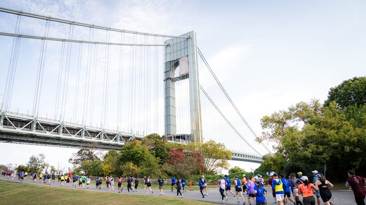 Runners in the shadow of the Verrazzano-Narrows Bridge at the NYRR Staten Island Half