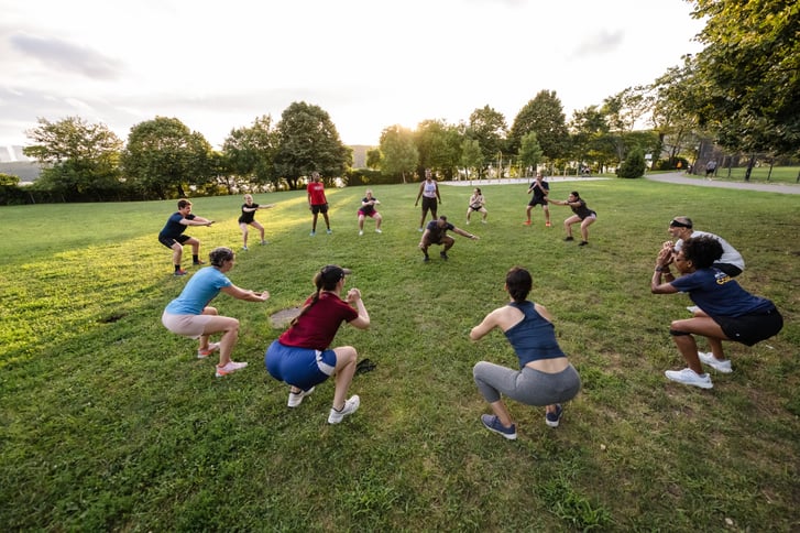 Group Training runners in Fort Tryon Park doing strength training