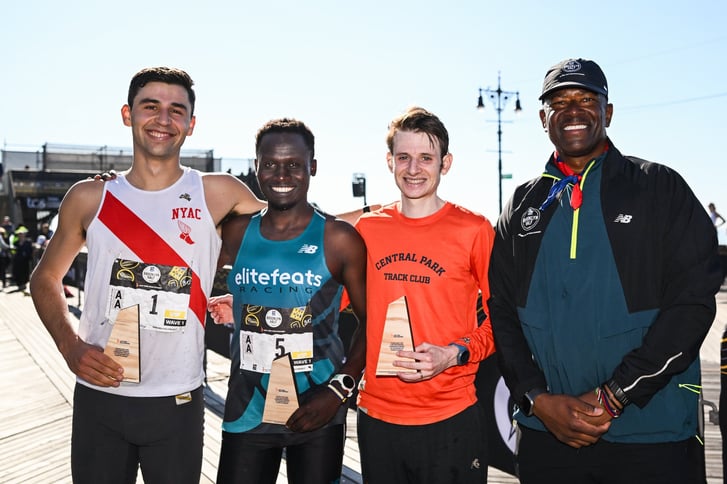 Owen Ritz, Abraham Longosiwa, Ryan Kutch, and Ted Metellus after the 2026 RBC Brooklyn Half on the Coney Island boardwalk.