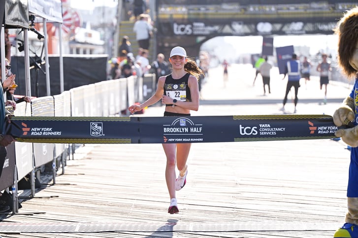 Fatima Alanis breaking the tape to win the 2026 RBC Brooklyn Half on the Coney Island boardwalk
