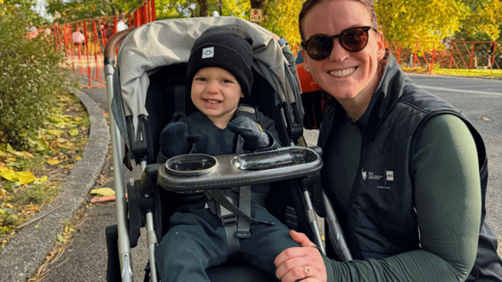 Pam Geisel after the Abbott Dash 2025 with her son in stroller