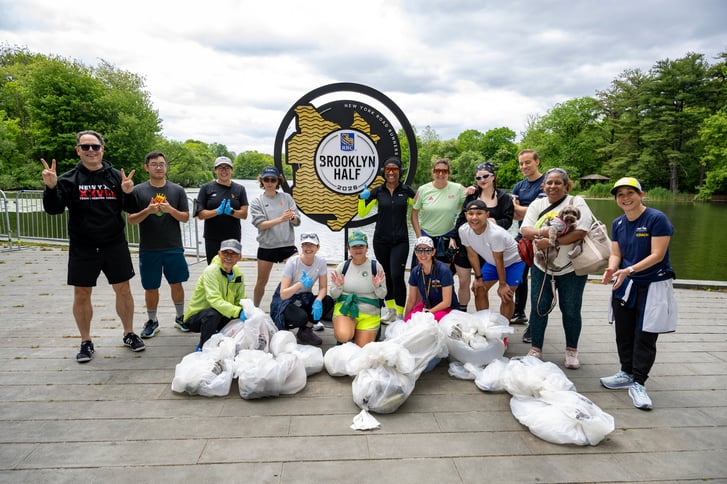 Group photo of people after plogging at the 2026 RBC Brooklyn Half Expo
