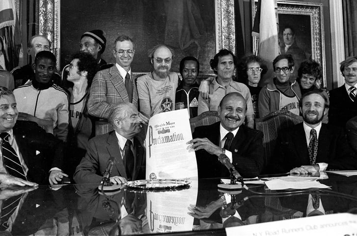 Black and white photo of the proclamation of the first five borough Ne