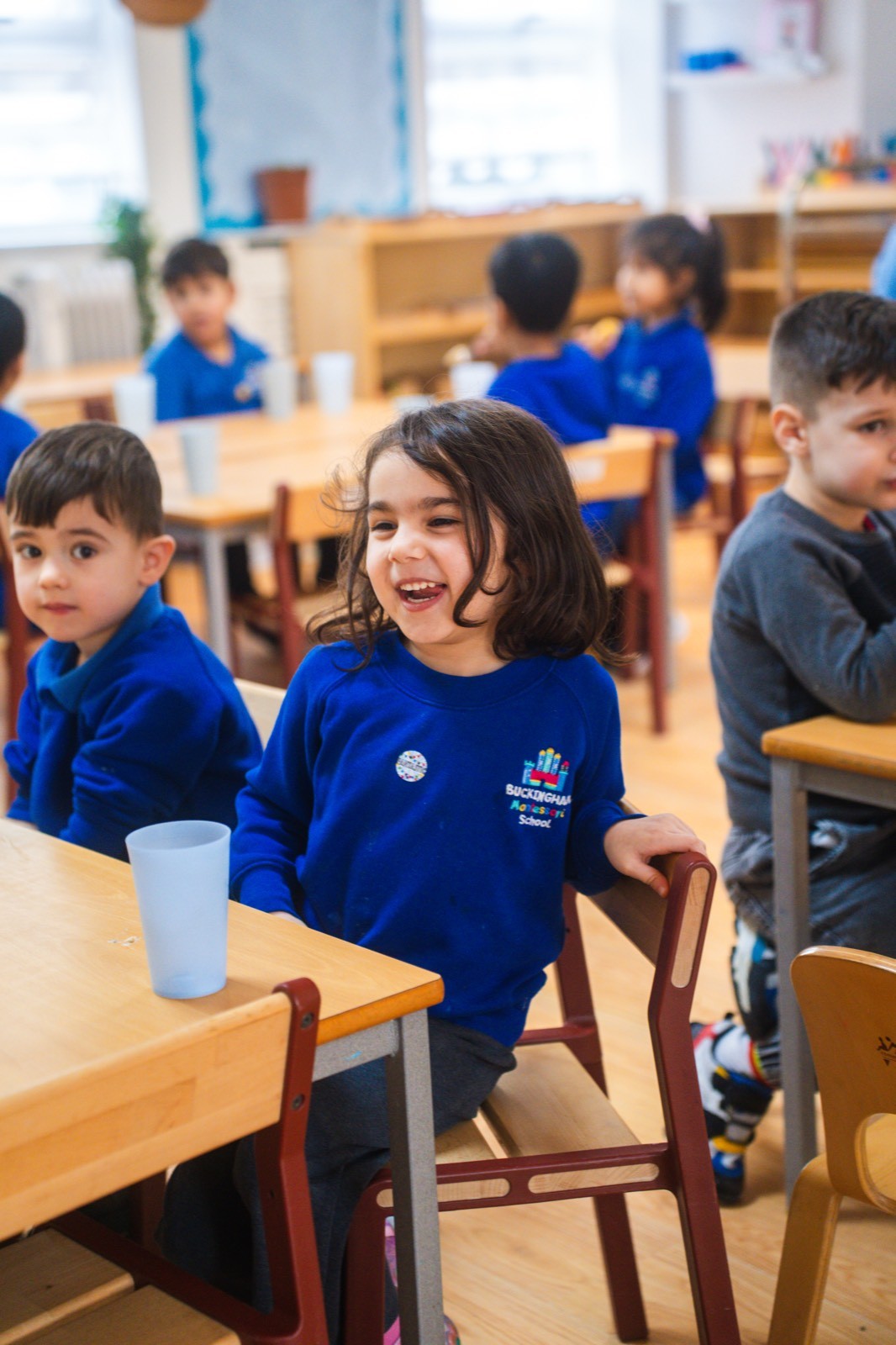 Laughing child enjoying nursery activities