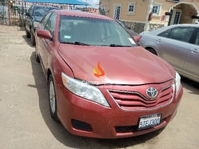 RED TOYOTA CAMRY LE V6 2010