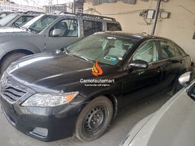 BLACK TOYOTA CAMRY LE 2010