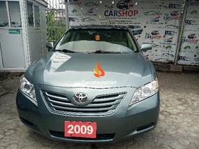 GREEN TOYOTA CAMRY LE 2009
