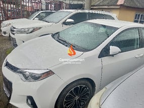 WHITE TOYOTA COROLLA SPORT 2014