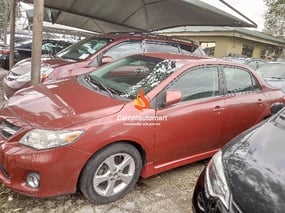 RED TOYOTA COROLLA SPORT 2011