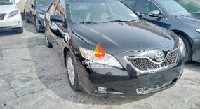 BLACK TOYOTA CAMRY LE 2009