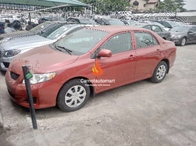 RED TOYOTA COROLLA LE 2009