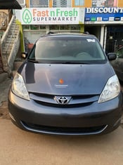 A clean blue 2010 toyota sienna