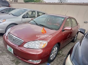 RED TOYOTA COROLLA 2007