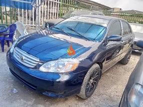 BLUE TOYOTA COROLLA LE 2002