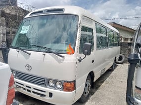 WHITE TOYOTA COASTER BUS 2014