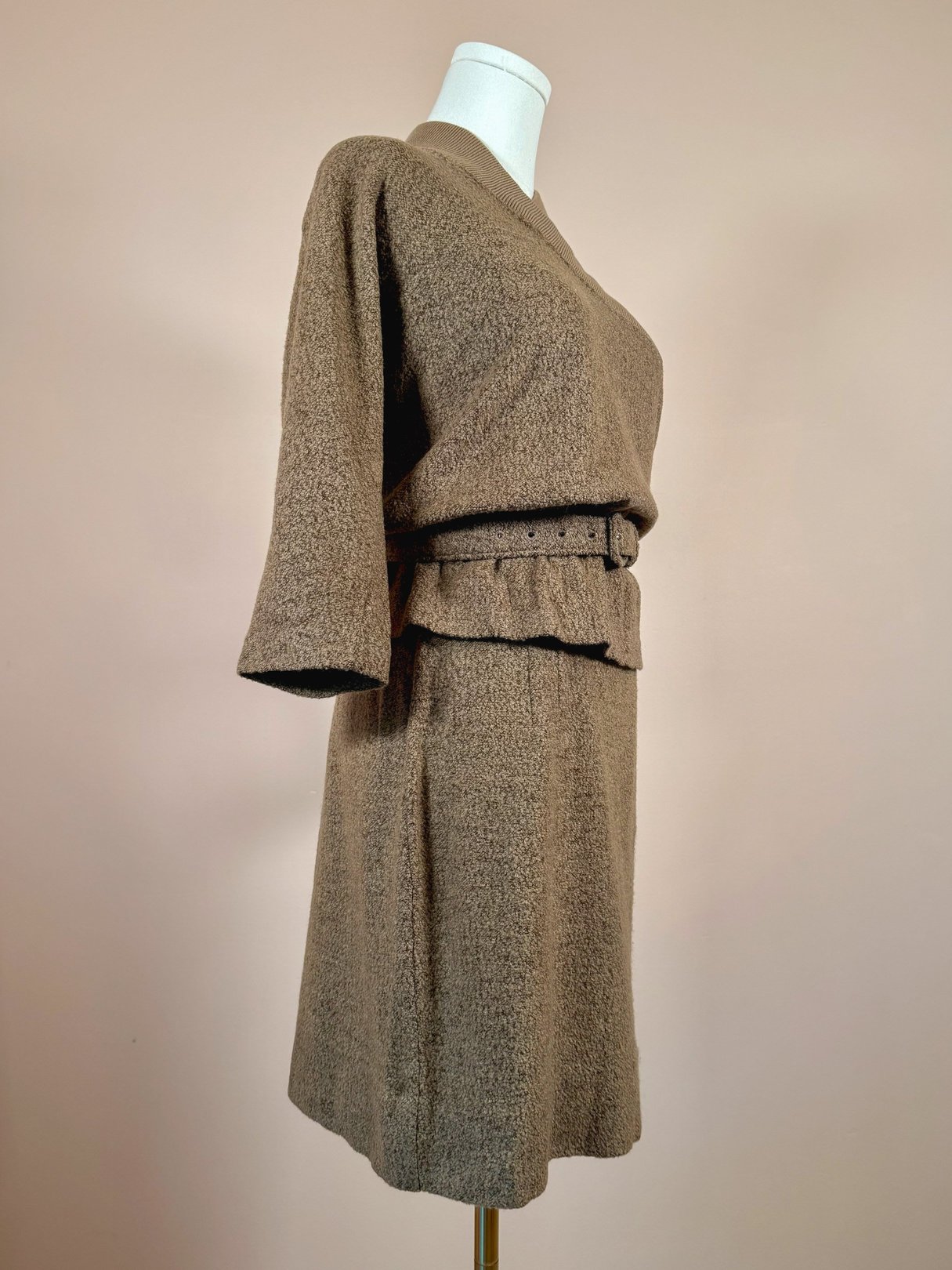 1950s tan Jantzen Hearthside knit set for women, featuring a belted top and skirt design.