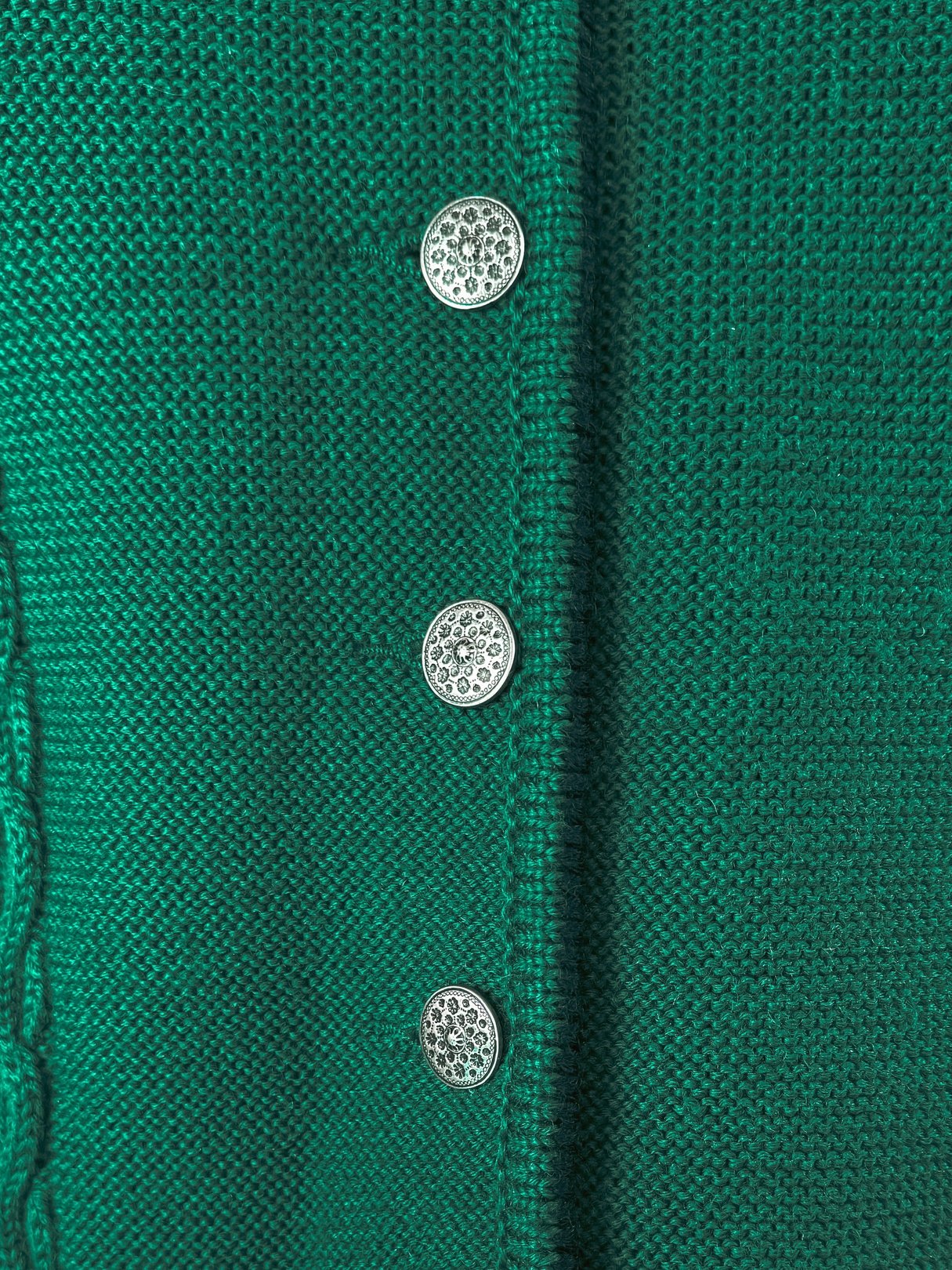 Green 1980s women's cardigan with tulip embroidery and decorative silver buttons.
