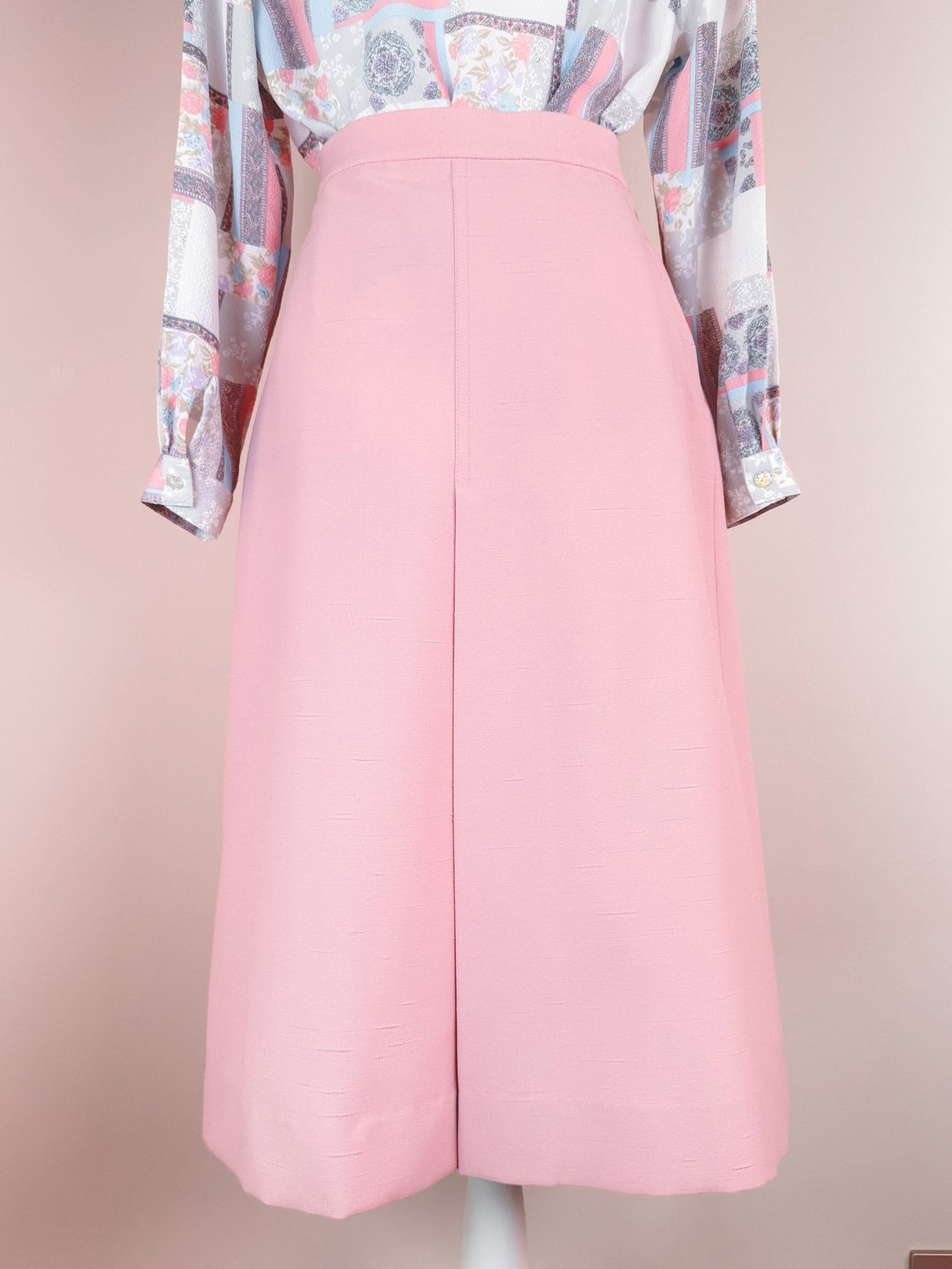 Blush pink Lilli Ann 1970s skirt from a three-piece suit, featuring a high-waisted design and a straight, knee-length cut.