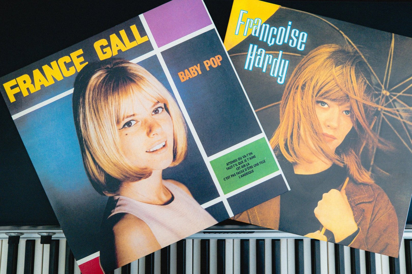 Two vintage music album covers featuring close-up portraits of female artists, with titles "Baby Pop" and "Françoise Hardy.
