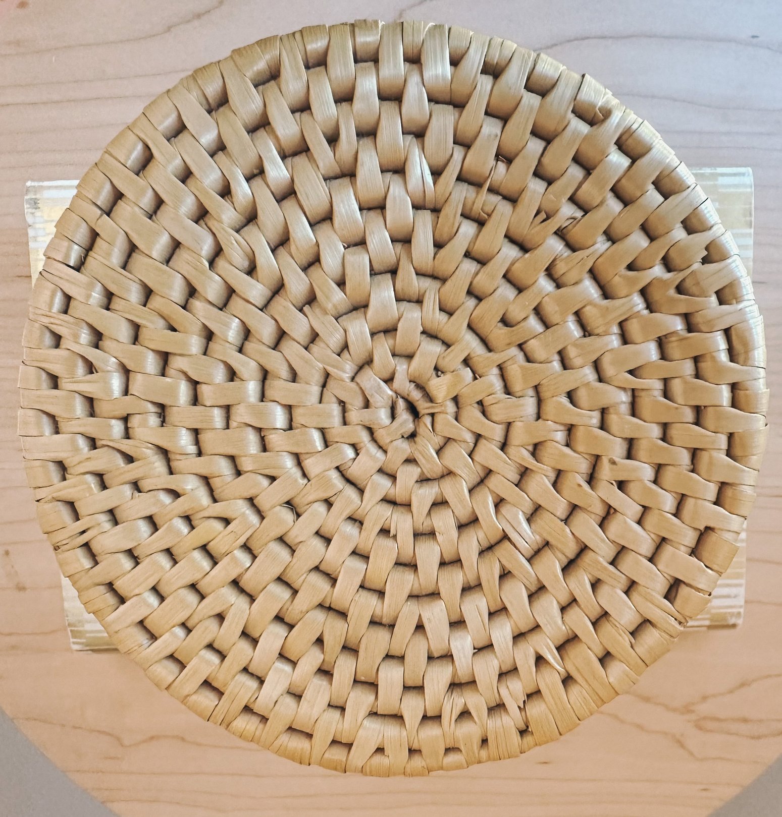 Round woven trinket basket from the 1970s in brown, suitable for home decor.