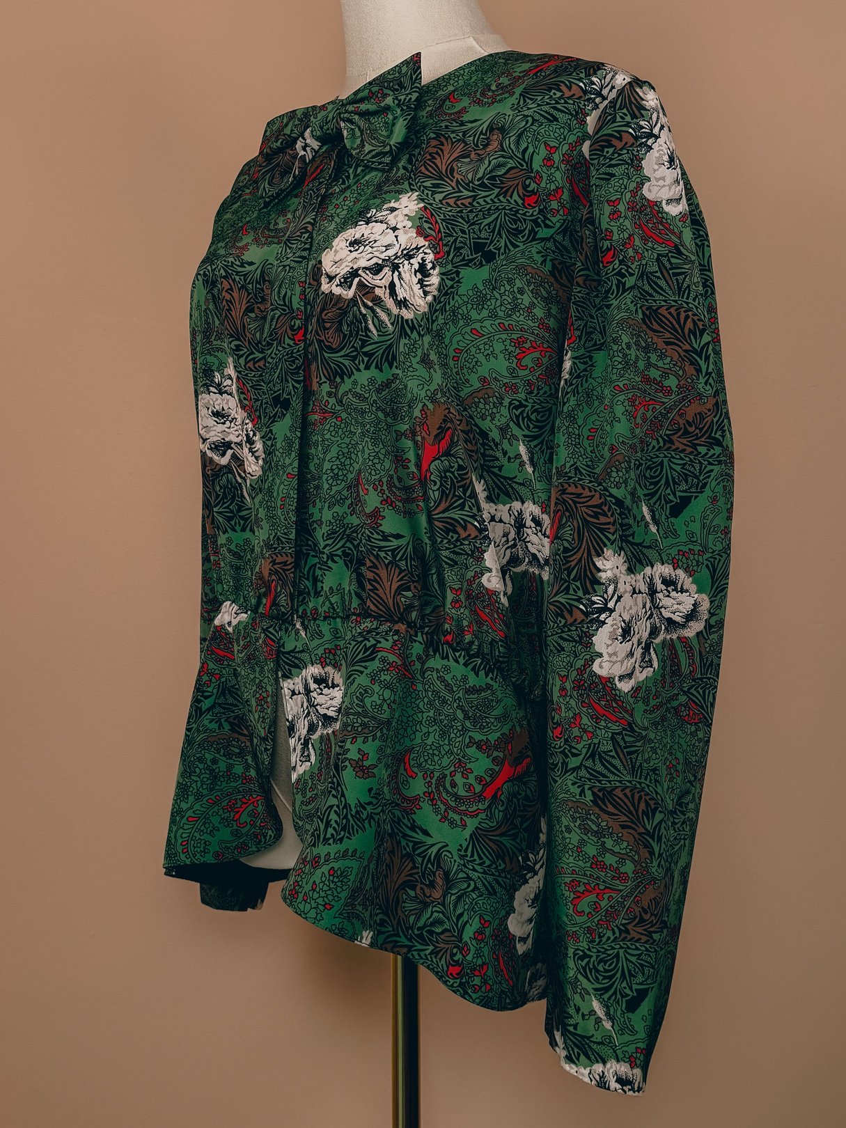Red and green floral patterned bow top from the 1980s for women.