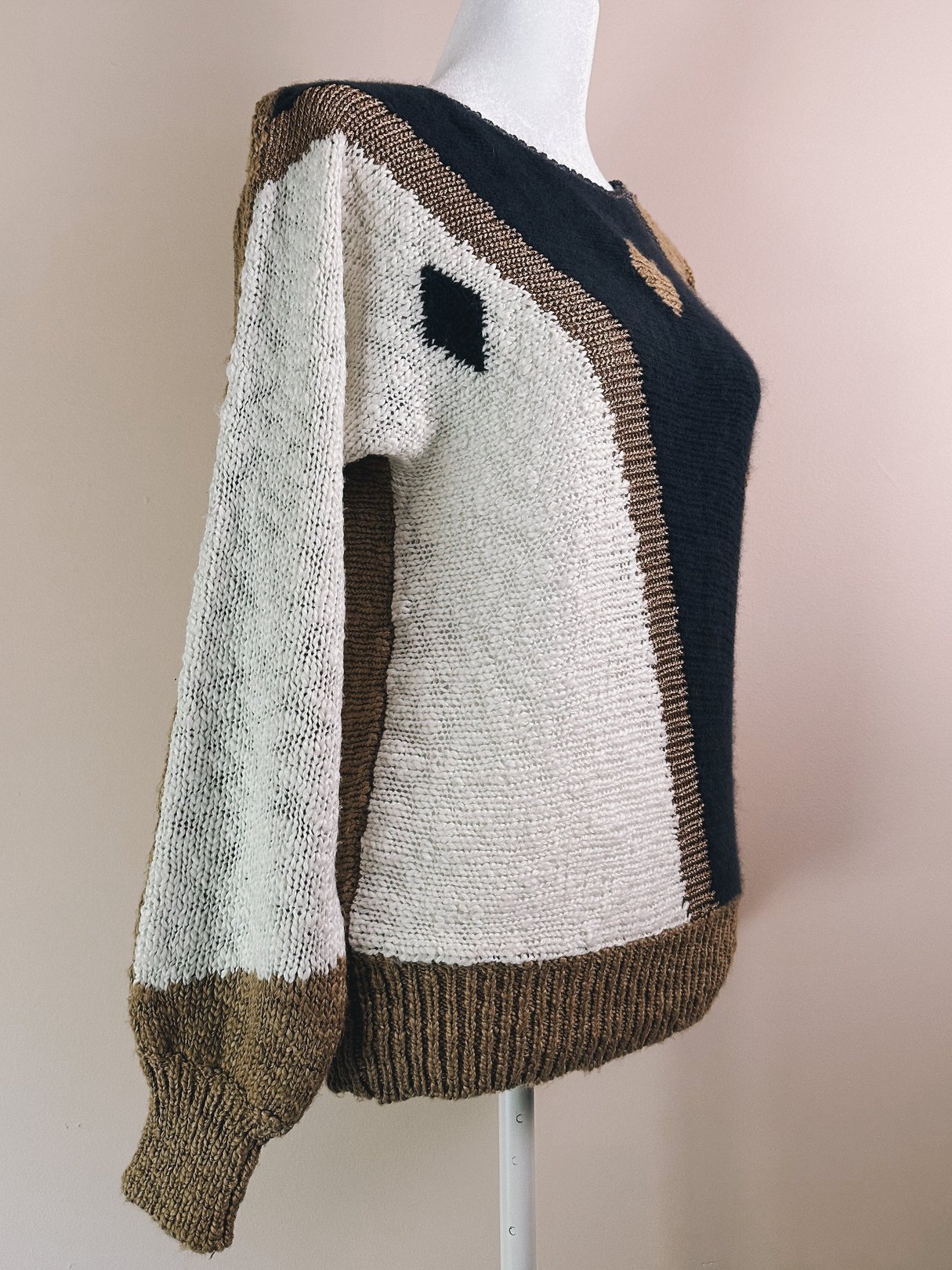 Blue and cream 1980s women's Abstract Diamond Flagstaff sweater featuring geometric color blocking and a relaxed fit.