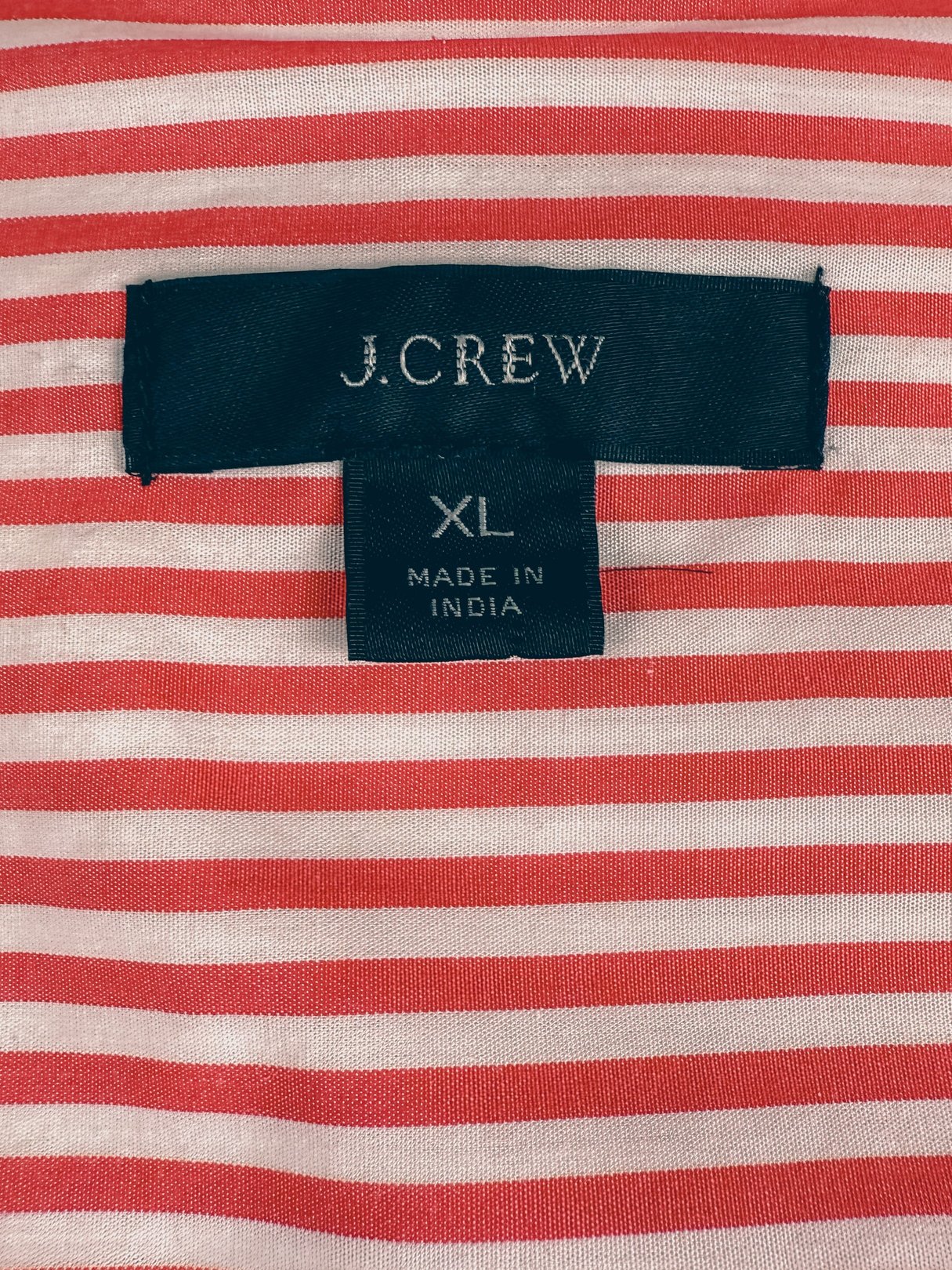 Red and white striped button-down top from J.Crew, featuring a label indicating size XL and made in India.
