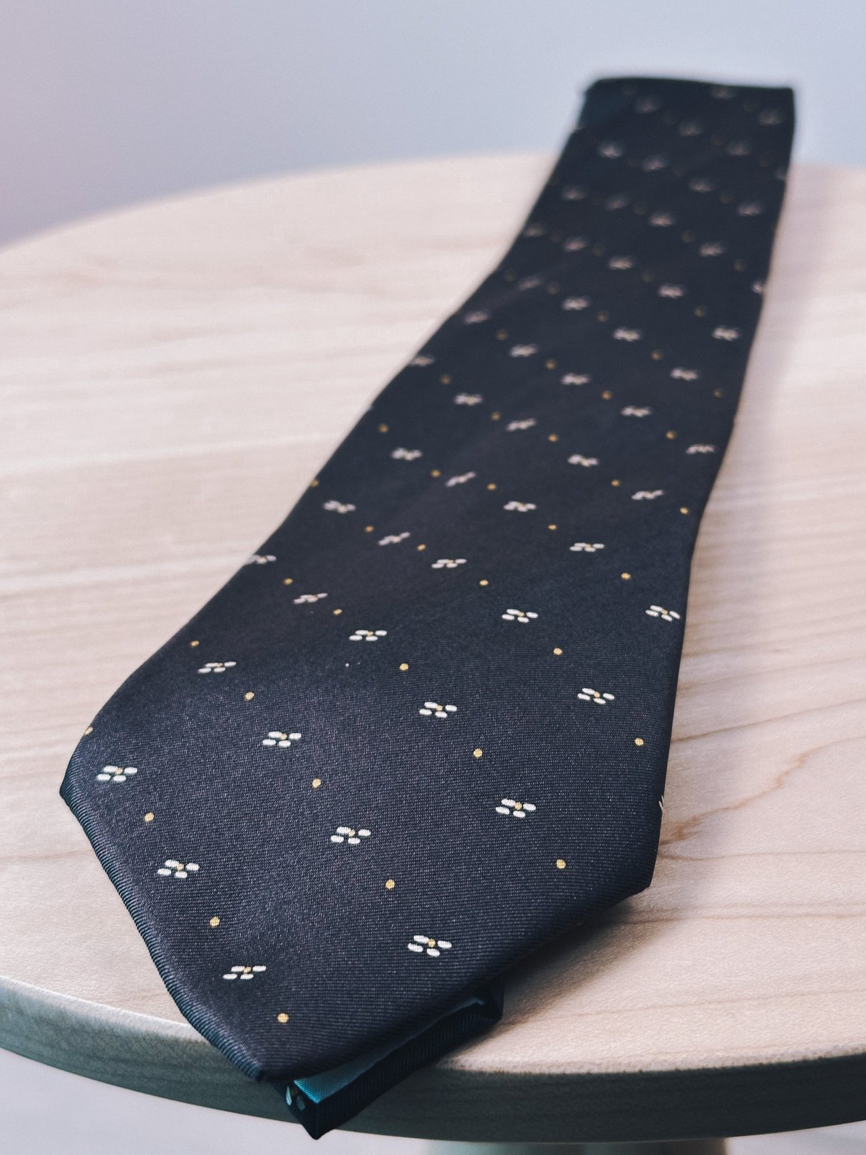 Brown tie with yellow dots, designed for women, from the 1970s.
