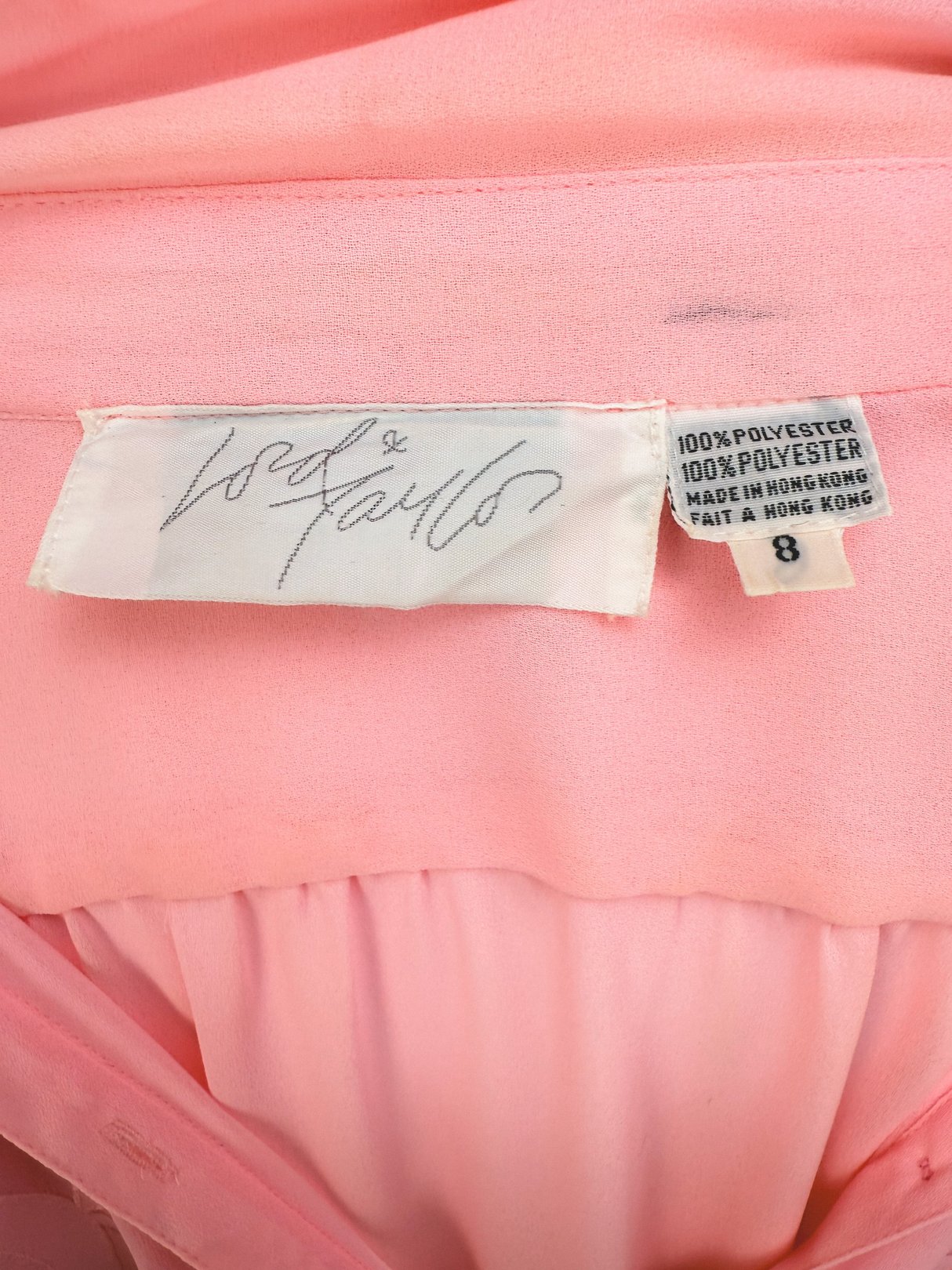 Flora Belle Dress in bubble gum pink from the 1980s, made of 100% polyester, size 8, with a brand label.