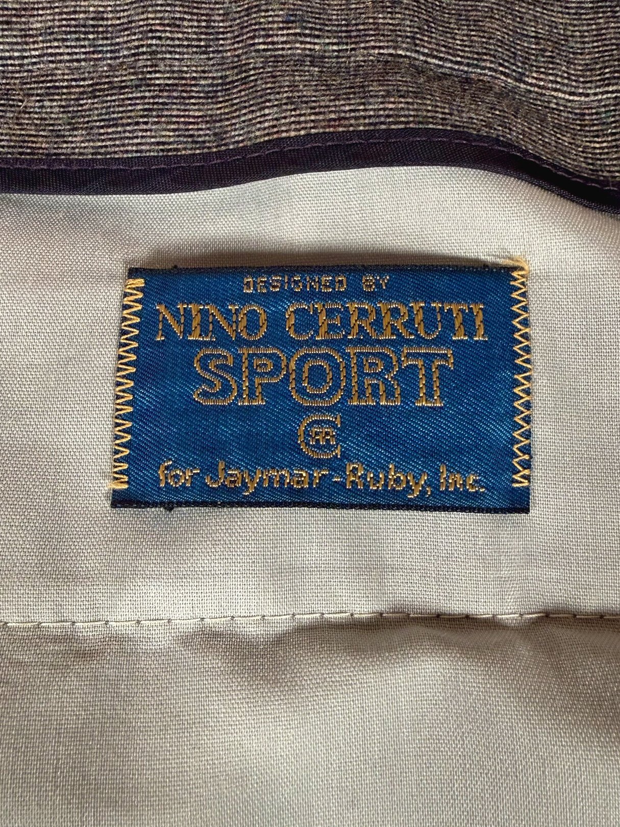 Nino Cerruti Trousers for men in blue, designed in the 1980s, featuring a label indicating "Nino Cerruti Sport.