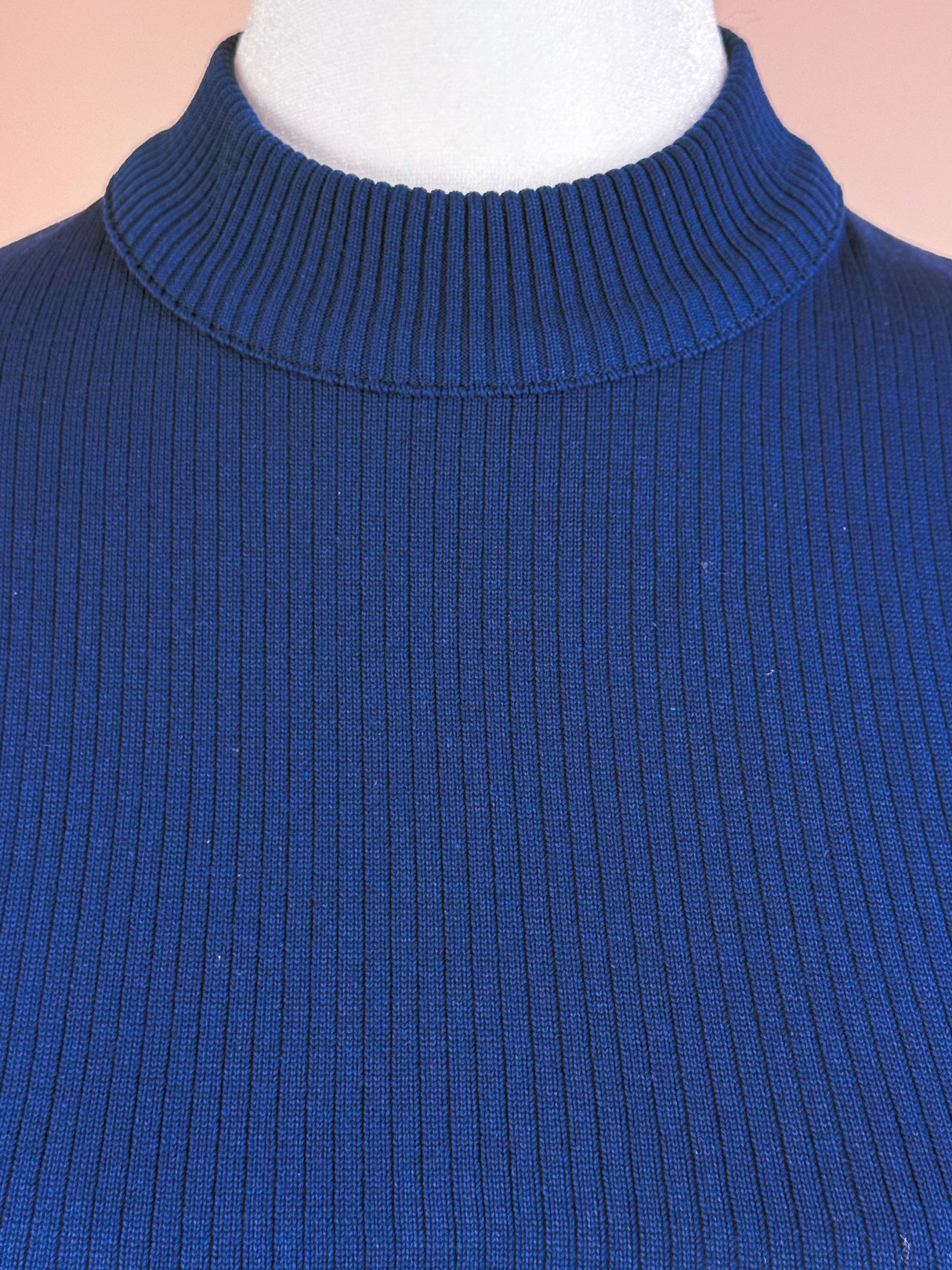 Navy blue retro ribbed mock neck top for women, featuring a textured design typical of the 1970s fashion era.