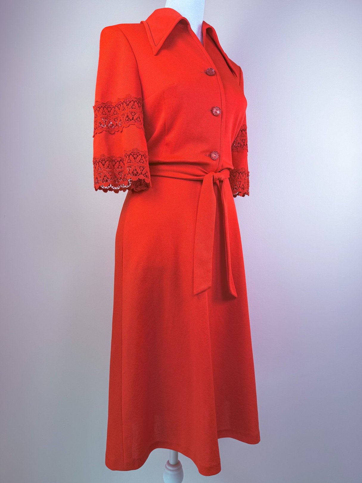 Red 1970s women's Cherry Lace Bell Dress featuring lace details on the sleeves and a belted waist.