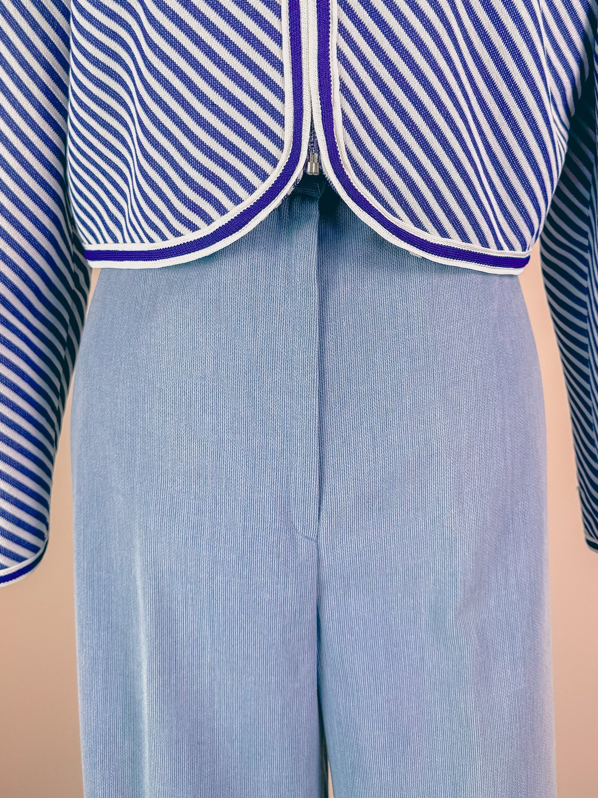 Light blue 1970s women's pants featuring a high-waisted design.
