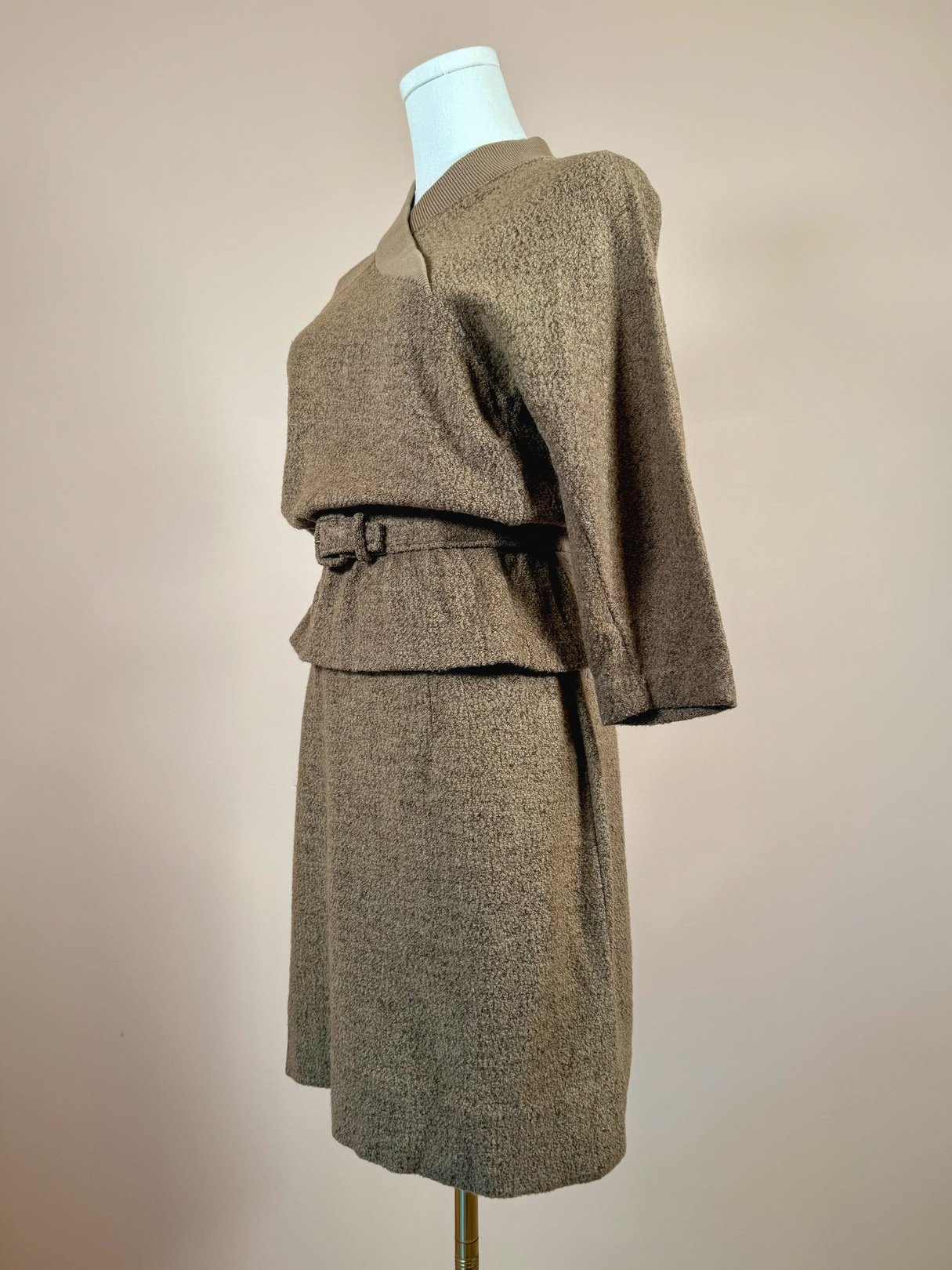 1950s women’s tan Jantzen Hearthside knit skirt set featuring a three-quarter sleeve top and matching belt.