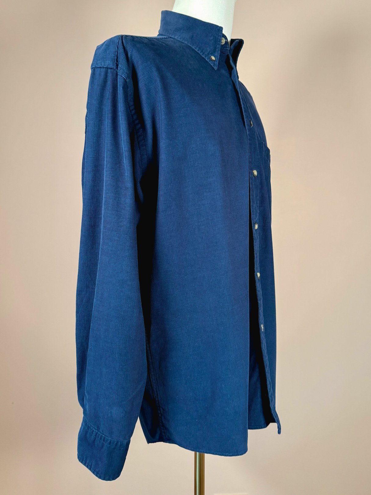 Navy blue 1990s men's Pendleton Cabin Cord shirt featuring a button-up front and long sleeves.
