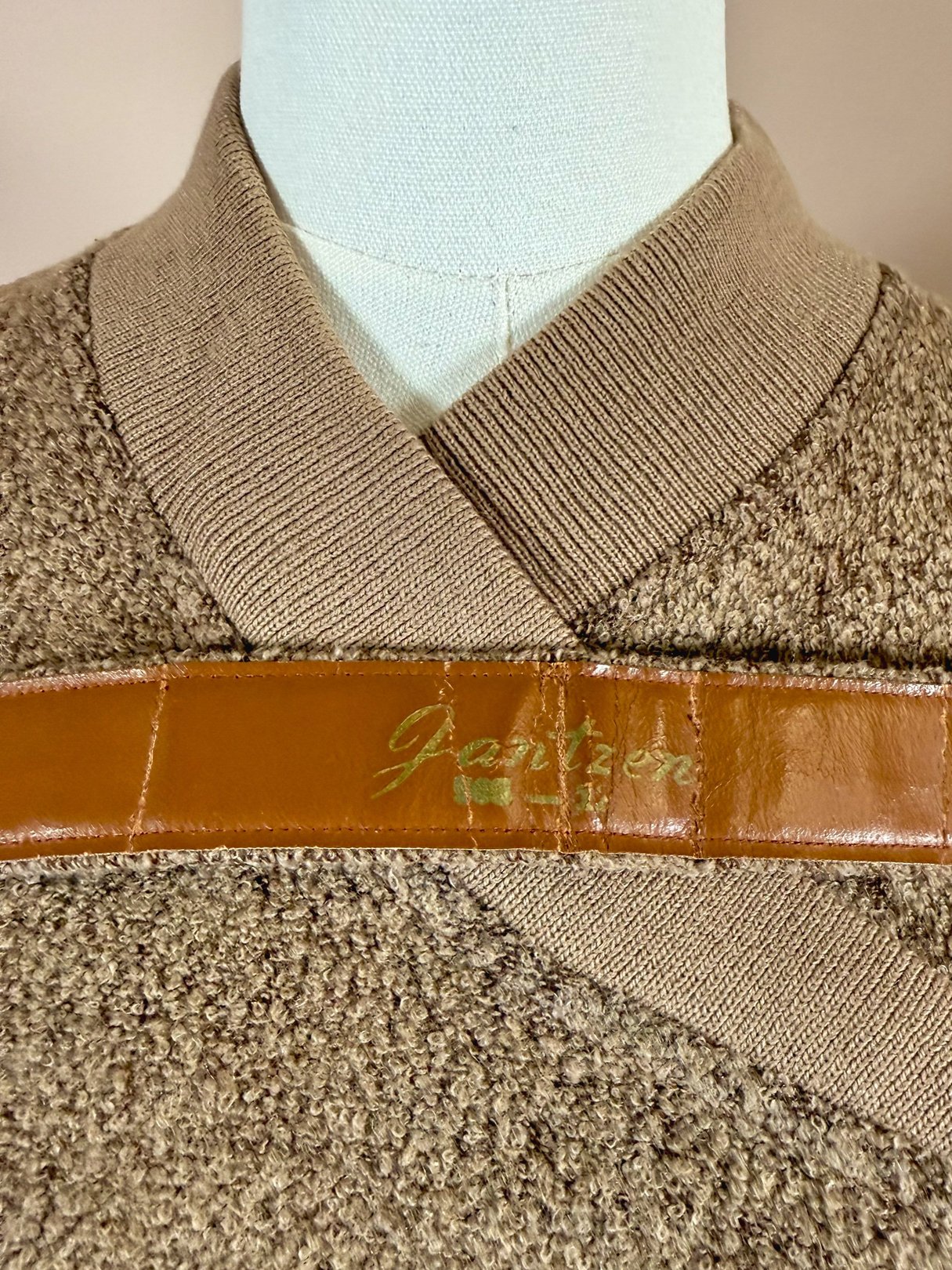 Tan 1950s Jantzen Hearthside knit set featuring a textured fabric and a leather label.