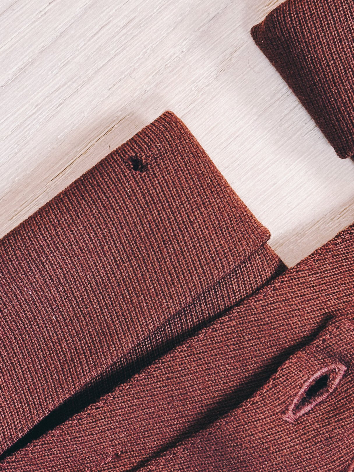 Chestnut women's pants from the 1990s featuring a textured fabric and a folded waistband.